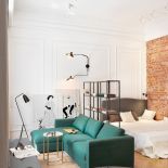 Biel, szmaragd i czerwona cegła w stylowej warszawskiej kawalerce