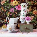 Kubki z kolekcji Biała Maria z kwiatową dekoracją, ROSENTHAL.PL