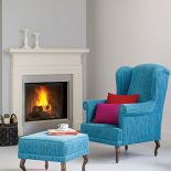 Angielski kominek z wapienia firmy Chesney s - prosty ale z charakterem. Fotel kupiony od rzemieślnika