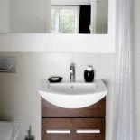 Apartament w parku nad stawem ma wszystkie zalety willi z ogrodem. Nowoczesny i wygodny.