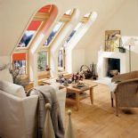 Balkon również na poddaszu. Okna pionowe połączono z połaciowymi, dzięki czemu można swobodnie wyjść na taras. Cena - 7250