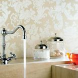 Bateria dwuuchwytowa Adlon, wykończenie: chrom (1431 zł) lub miedź. Uchwyty z porcelanowymi elementami, obrotowa wlewka.