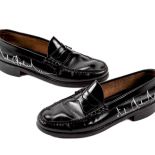 Buty Michaela Jacksona z jego autografem, cz 90 000 dolarów.