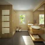 Grzejnik Curve jako wieszak na ręczniki, Nordholm