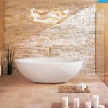 Drobna mozaika po lewej to kolekcja Goldenstone - 76 zł/m2, na podłodze trawertyn Alpaca - 291 zł/m2. ANICAR - GALERIE VENIS