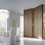 Drzwi jak ruchoma ściana, otwierają się na obie strony, można je pomalować, wyłożyć tapetą, nakleić