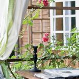 Ganek porośnięty różami. Z duchem renesansu