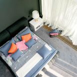 Inaczej niż zwykle bywa, sypialnia to nie intymny pokoik - jest wysoka na dwa piętra.