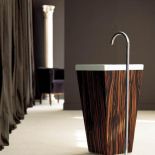 Kolekcja Concert firmy Pomd or. Ceramiczna umywalka i drewniana obudowa w kolorze hebanu kosztuje 7137 zł. OMNIRES