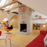 Komink z betonu i cegły. Poddasze z dodatkiem czerwieni