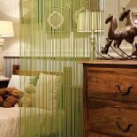 Konie na biegunach z kolekcji Fauna. Za mniejszego zapłacimy 149 zł. Zasłona sznurkowa Ado - 709 zł. ALMIDECOR