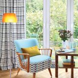 Kraciaste zasłony (Designers Guild) i fotel to pomysł Justyny, na stole wazony Alvara Aalto - Savoy Vase.