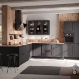 narożna kuchnia w stylu lontowym otwarta na salon