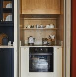 kuchnia schowana w szafie