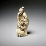 Leżący pies z muszlą , kość słoniowa, ok. 1770 r.