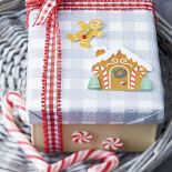 Papierowe pierniczki na wieczku - ciekawe, co się pod nimi skrywa?