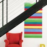 Mebli niewiele, ale dzięki temu magnetyczne obrazy od razu przykuwają wzrok.