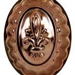 Miedziana, z lilijką. Historia foremek do ciast i na masło