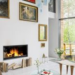 Mniej znaczy więcej. Początkowo kominek miał mieć ceramiczną koronkę, ale ostatecznie stanęło na rozwiązaniu najprostszym