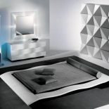 Na fali - kolekcja Onda firmy Angelo. Do wyboru - w kolorze wiśni, wenge, ze skóry. Łóżko ma z