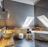 nowoczesna łazienka z wanną na poddaszu