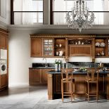 Pałacowa Dolcevita włoskiej marki Stosa – wyspa, zdobiona pilastrami i patynowana na złoto, ma wygodne wcięcie na nogi STUDIO