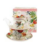 prezent pod choinkę dzbanek z zaparzaczem i filiżanką