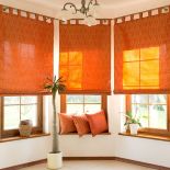 Rolety w energetycznych kolorach - ocieplą pomieszczenie.