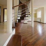 Schody z litego dębu - samonośne, na giętej belce, balustrada ze stali nierdzewnej. PRACOWNIA STOLARSKA WŁODARCZYK.