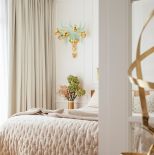 kinkiety ze szkła murano w sypialni