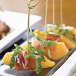 Szynka parmeńska z melonem i oliwą truflową.