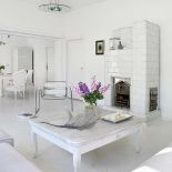 Salon stanowi jedną wielką przestrzeń połączoną z jadalnią.