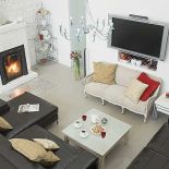 W salonie nie mogło zabraknąć dużego telewizora.