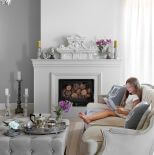 We wnętrzach dominują beże, szarości i złamane biele.