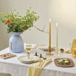 Wielkanocne dekoracje stołu pastele żółty