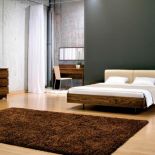 Wraca moda na puchowe piernaty, poduchy, pledy, kapy, falbany, koronki...