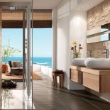 Z kolekcją Pure Stone (umywalka 2900 zł, szafka 10 350 zł) i Squaro (kabina prysznicowa, bateria