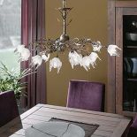 Żyrandol firmy Massive pasuje i do wnętrz klasycznych i nowoczesnych. Cena - 850 zł. GALERIA MEBLI CAROLINE - CENTRUM WITEK