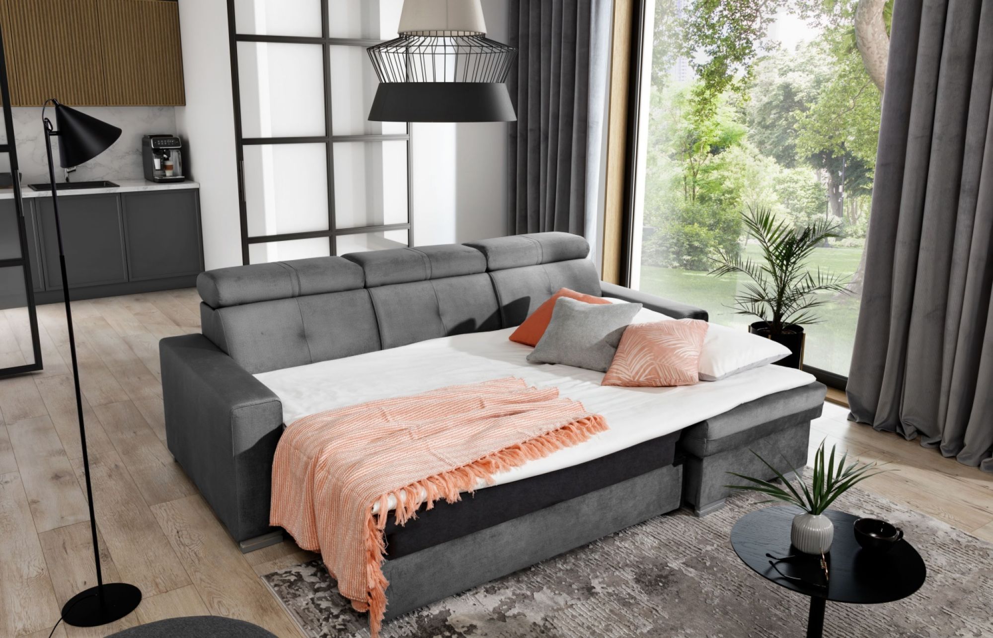 przytulny salon w mieszkaniu z rozkładaną kanapą