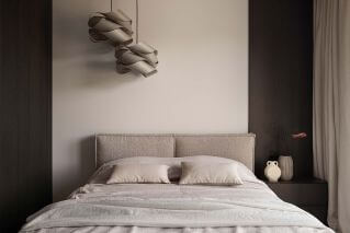 beżowo czarna sypialnia w apartamencie w porcie praskim