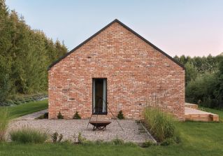 dom na wzór dawnych mazurskich stodół