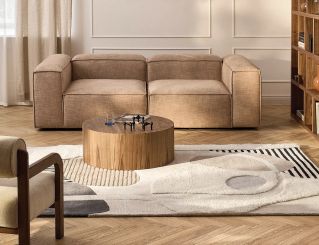 Kaszmirowa kanapa i ściana