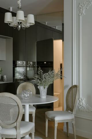 czarna kuchnia z jadalnią w mieszkaniu 60 m2