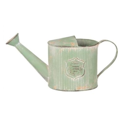 zielona metalowa konewka