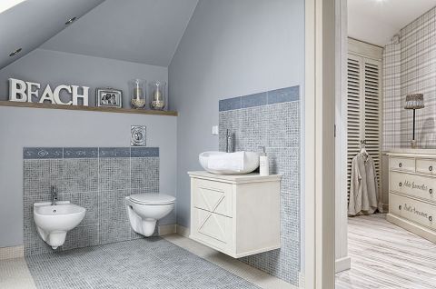 Pomysł na dom zrodził się podczas wakacji nad morzem. Jest spokojny, w kolorach piasku, z