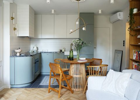 kuchnia narożna otwarta na salon