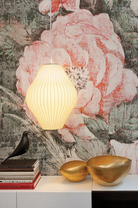 Dwustumetrowy penthaus otacza 120 metrów ogrodu. Ma dwie główne strefy: jadalnię al fresco przy grillu i salon wypoczynkowy z