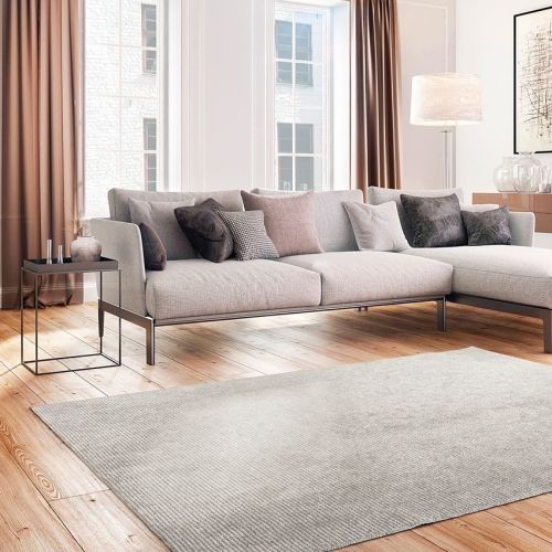 jak dobrać rozmiar dywanu w salonie