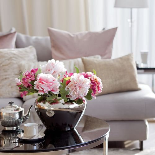 Marzyli o kameralnym budynku wśród zieleni, koniecznie na Ursynowie. Znaleźli i urządzili w stylu art deco.