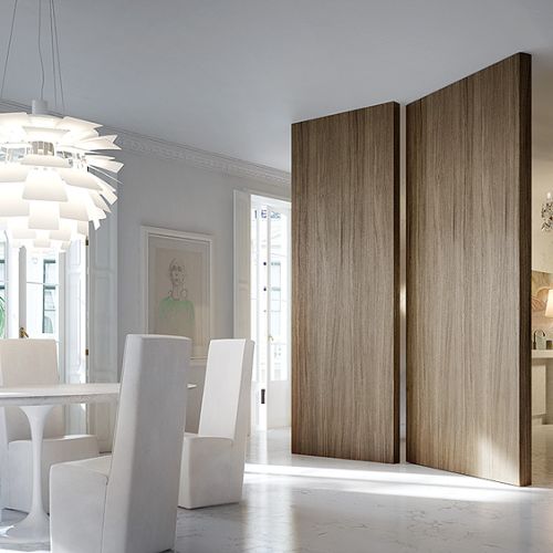 Drzwi jak ruchoma ściana, otwierają się na obie strony, można je pomalować, wyłożyć tapetą, nakleić